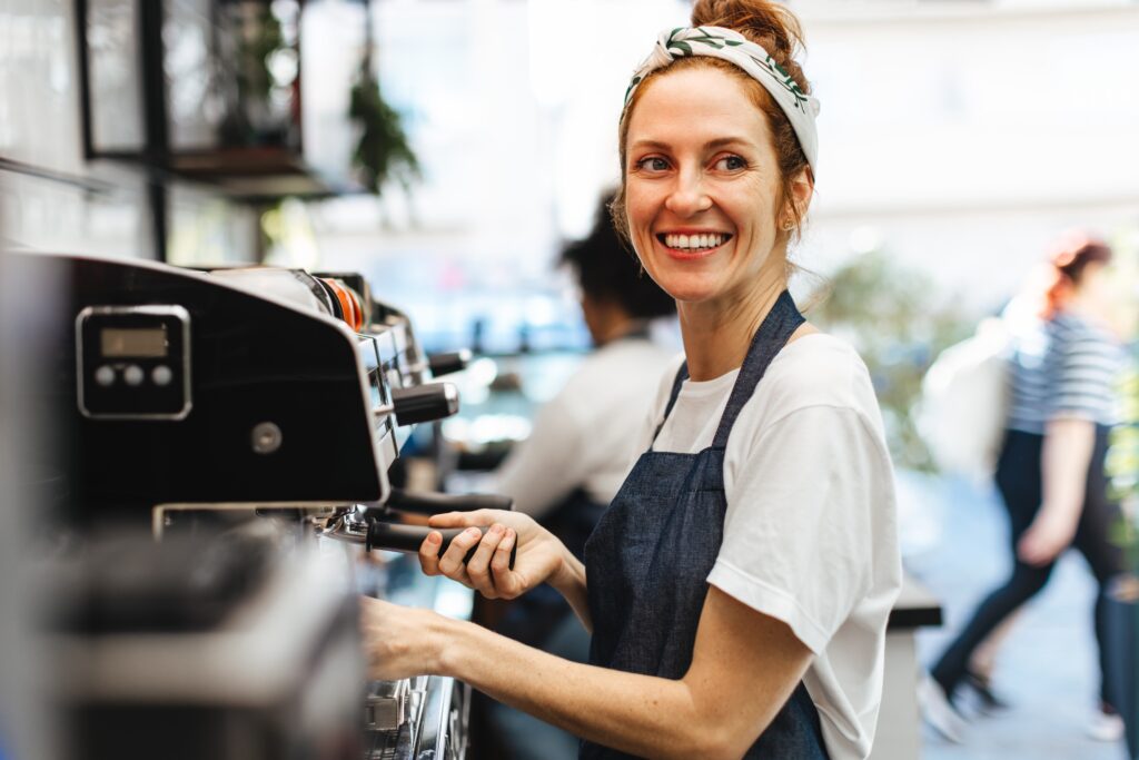 Waitress,Brewing,A,Fresh,Cup,Of,Coffee,For,A,Customer
